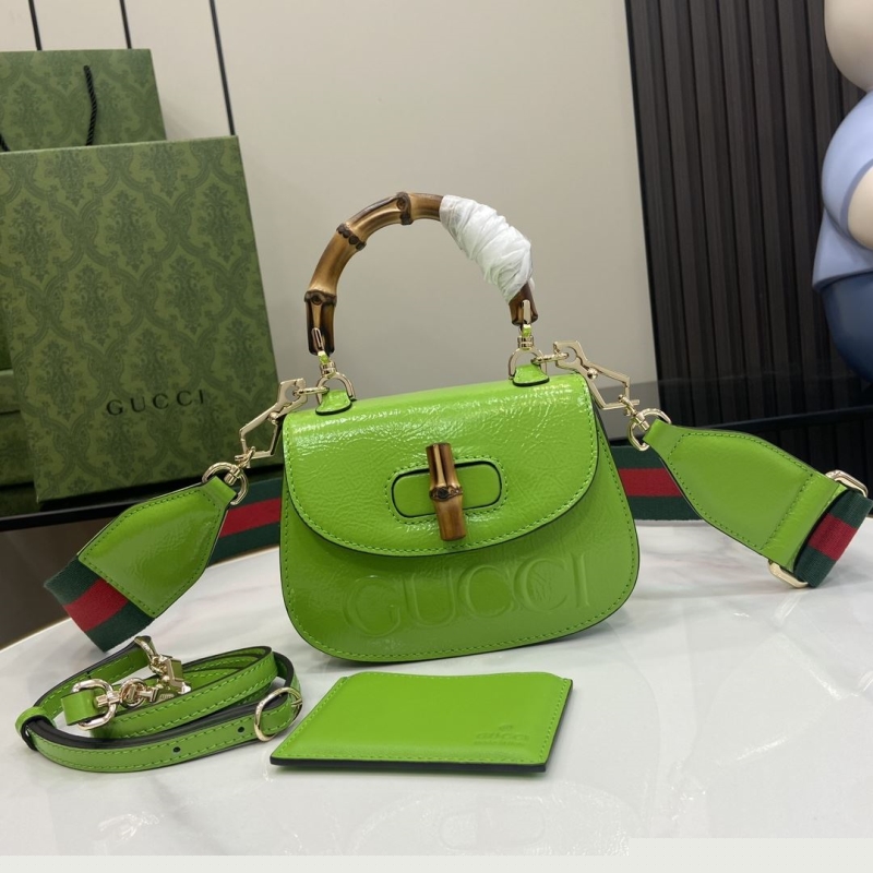 G*u*i top handle bags